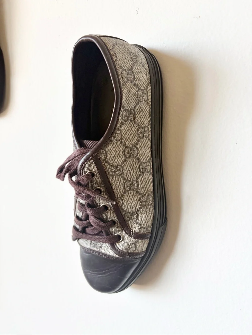 Gucci Men’s GG Canvas Low-Top Sneakers in Brown and Black
